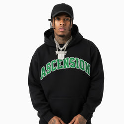 Person wearing a black hoodie with &