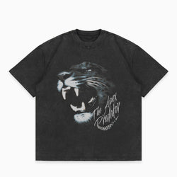 Black t-shirt with a panther graphic and text on a white background