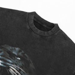 Black t-shirt with a graphic design on a white background