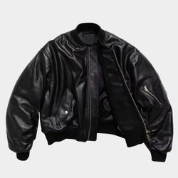 Black leather jacket on a light gray background