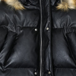 Black puffer jacket with fur-lined hood on a black background