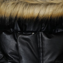 Close-up of a black leather jacket with fur trim