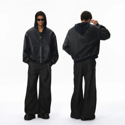 Person wearing a black hoodie and pants set from front and back views on a white background