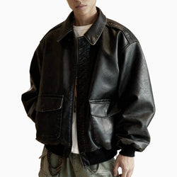 Person wearing a black leather jacket on a white background