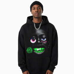 Person wearing a black hoodie with a graphic design on a white background