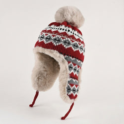 Knitted hat with fur trim and pattern on a white background