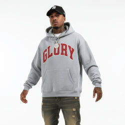 Man wearing a gray hoodie with &