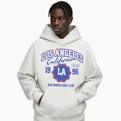 Person wearing a hoodie with &